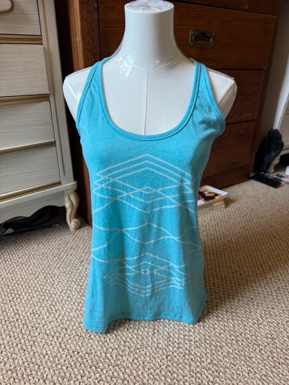 Old Navy blue tank top with white design and twist back